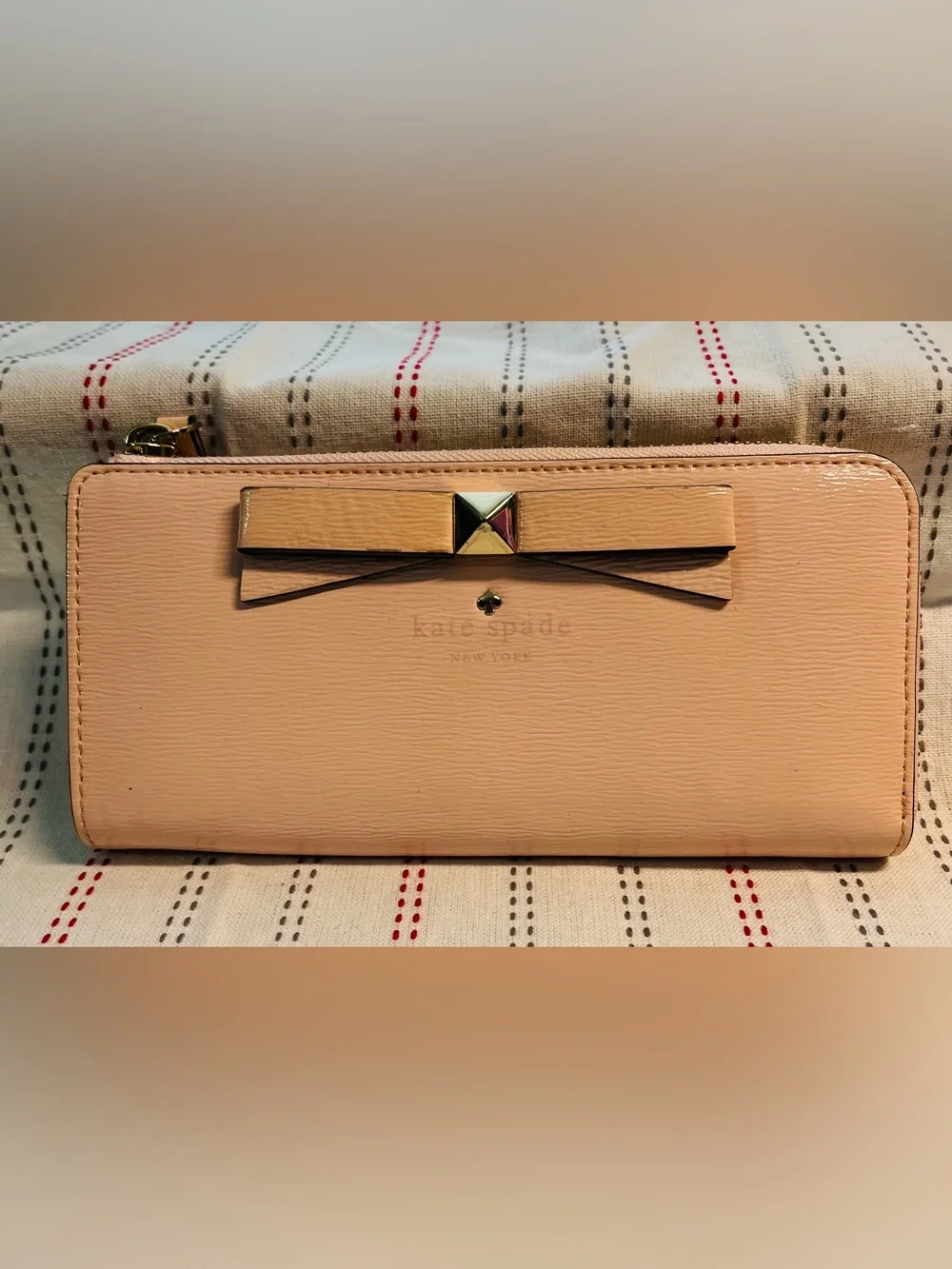 kate spade Beacon Court Nisha Leather Wristlet /Clutch with Storybook Lining.